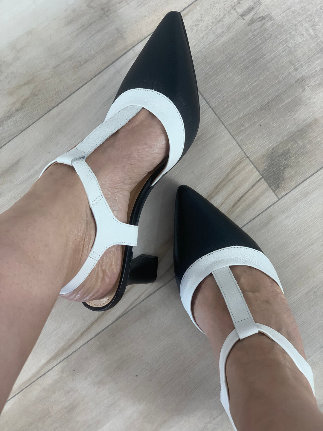 Tchocco Black & White Heels